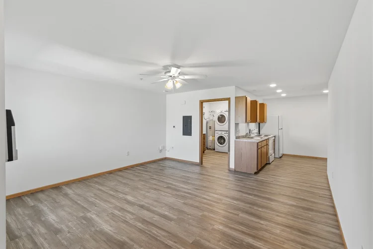 Greenfield Estates studio — open layout with kitchen