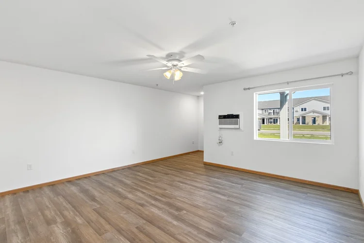 Greenfield Estates studio — living area with window