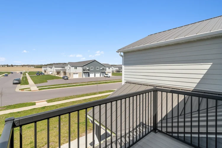 Greenfield Estates 2 bedroom upper — balcony view of farmland