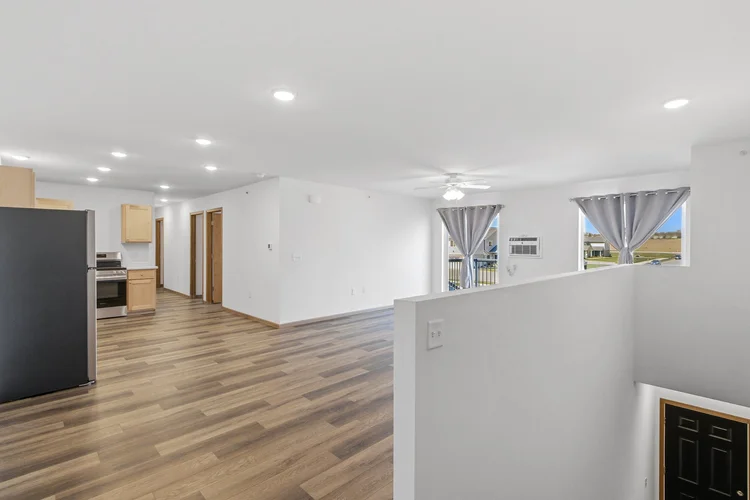 Greenfield Estates 2 bedroom upper — open layout with stairs