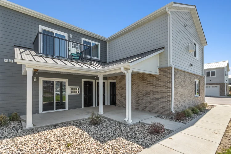 Greenfield Estates 2 bedroom over garage — exterior with balcony