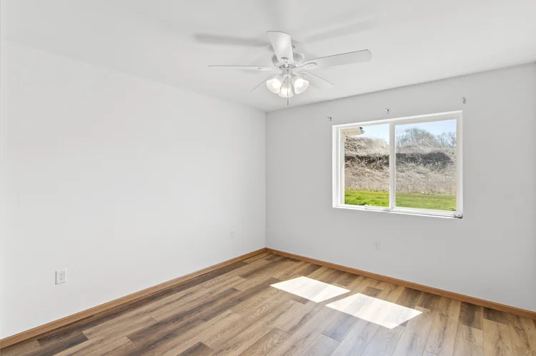 Greenfield Estates 3 bedroom lower — bedroom with view of fields
