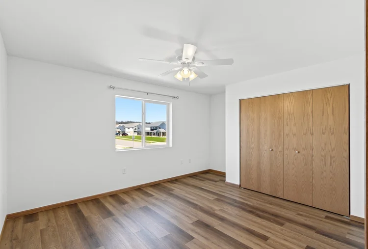 Greenfield Estates 3 bedroom upper — bedroom with community view